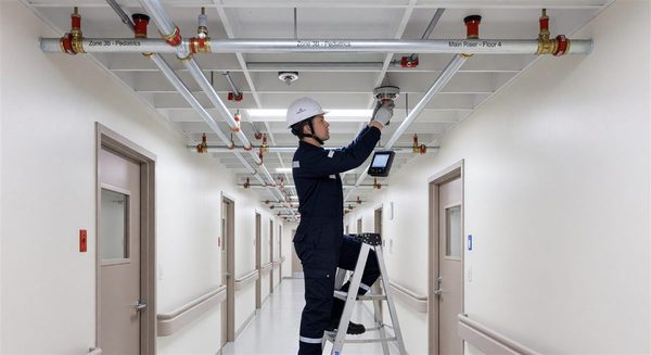 Hospital fire suppression sprinkler system inspection in a clinical corridor