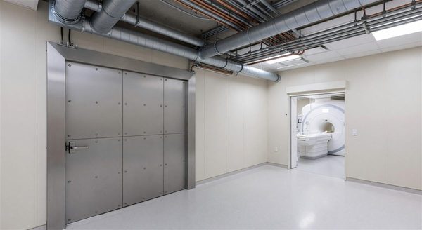 Hospital MRI suite with RF shielding door and HVAC infrastructure visible
